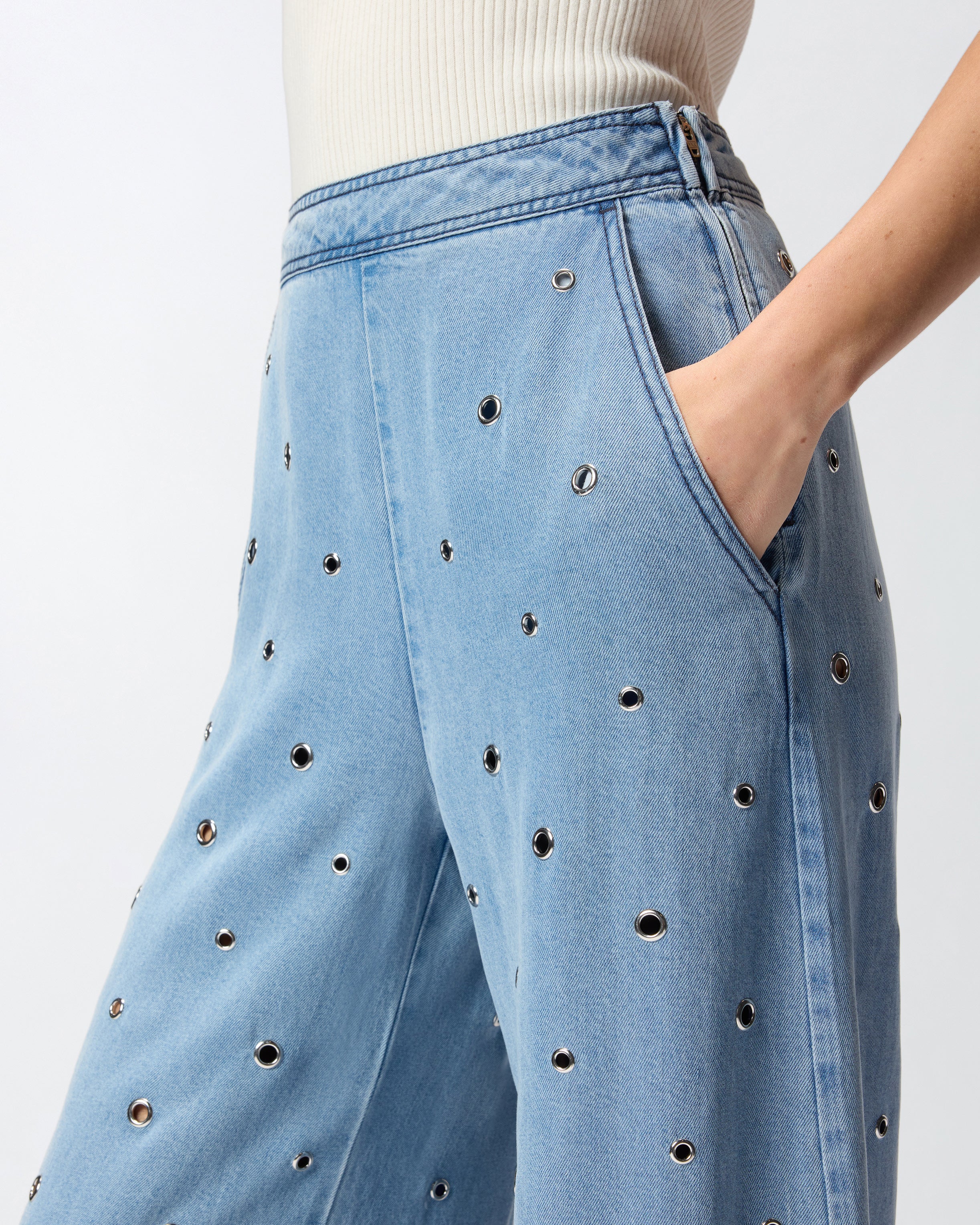 Denim jeans with eyelets - Image 4