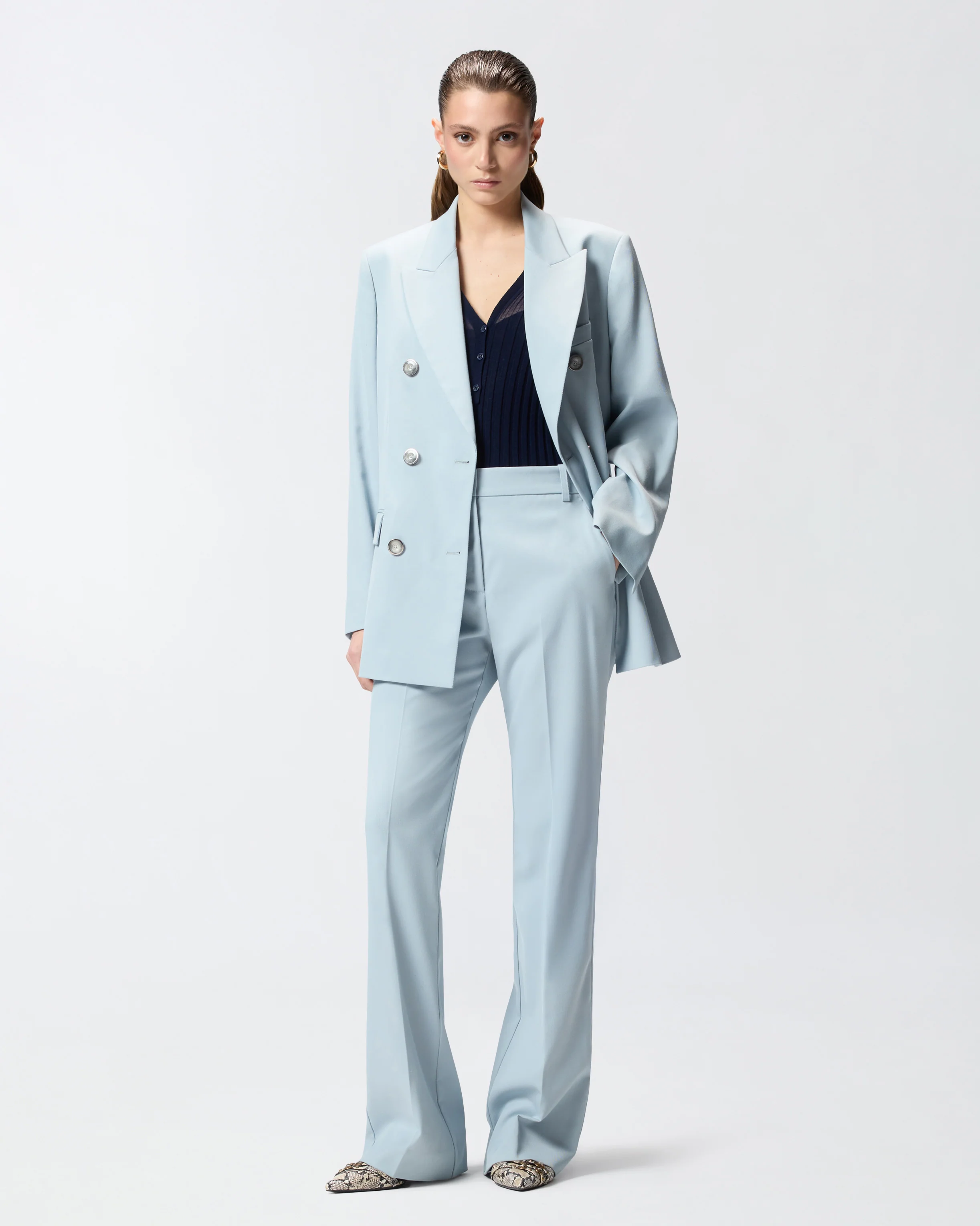 Flared trousers with pressed pleat detail