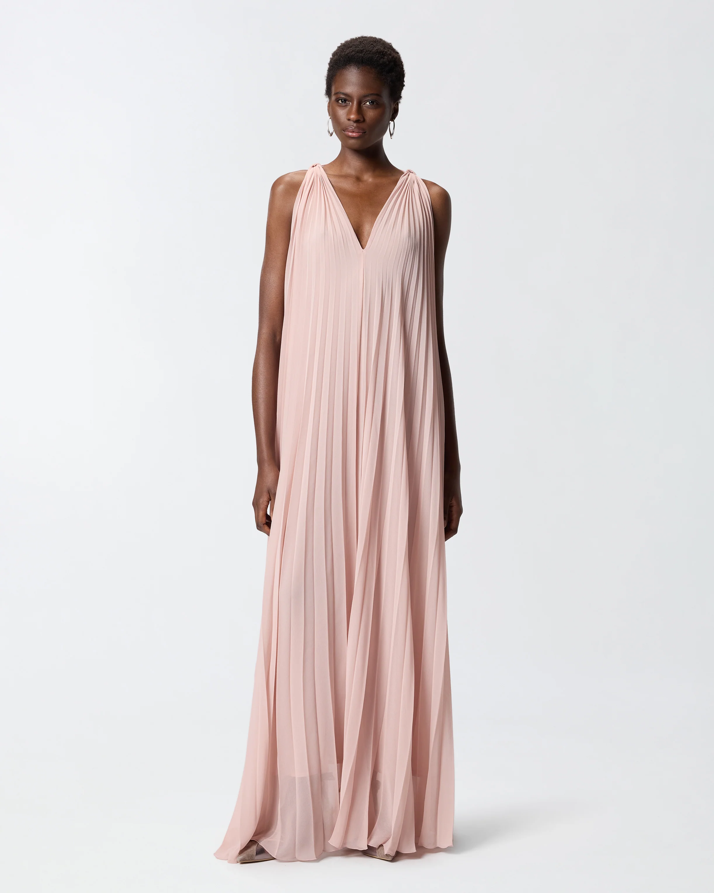 Long pleated dress with slit