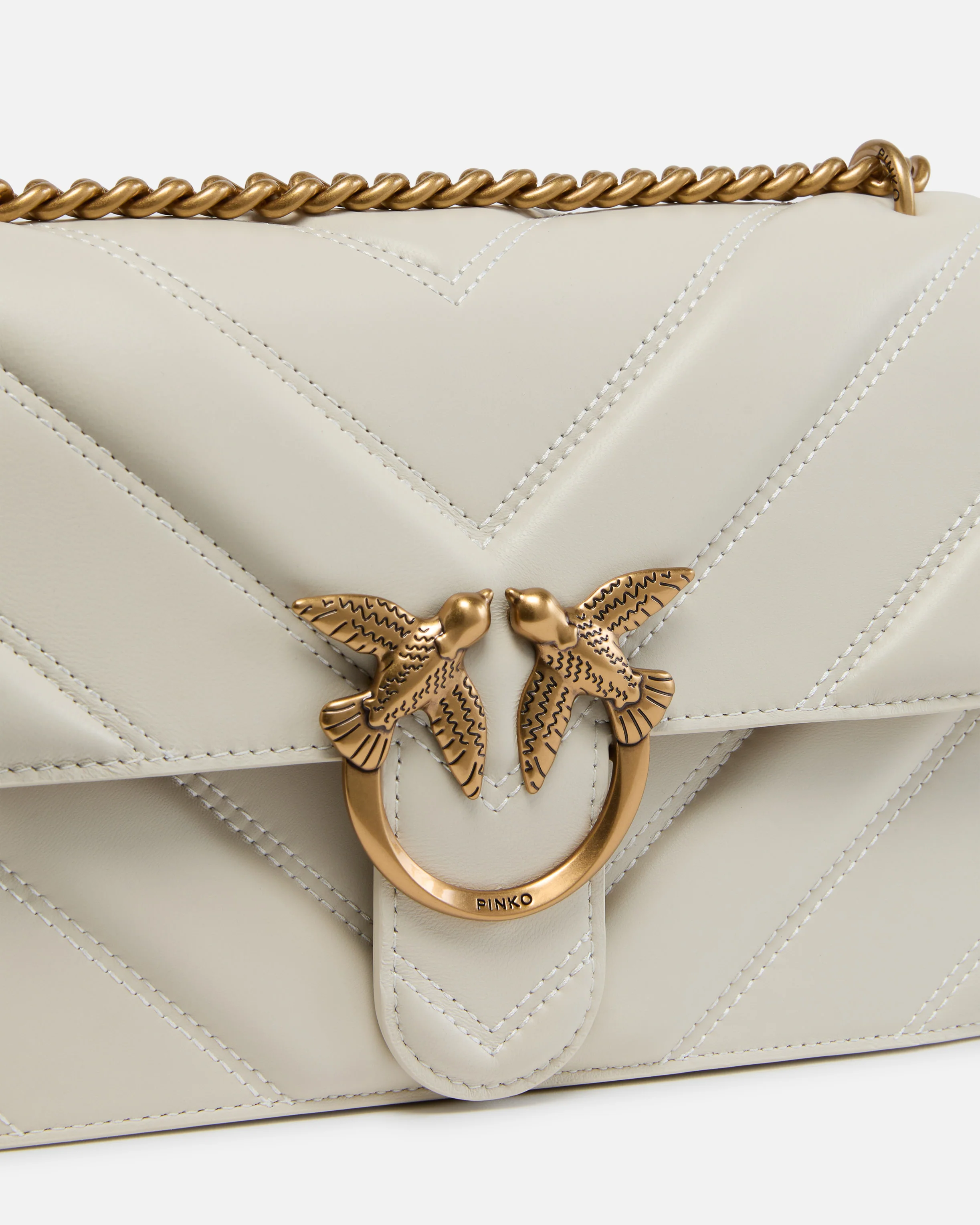 Medium Love Bag pebbled leather crossbody bag with V-shaped pattern and logo - Image 3