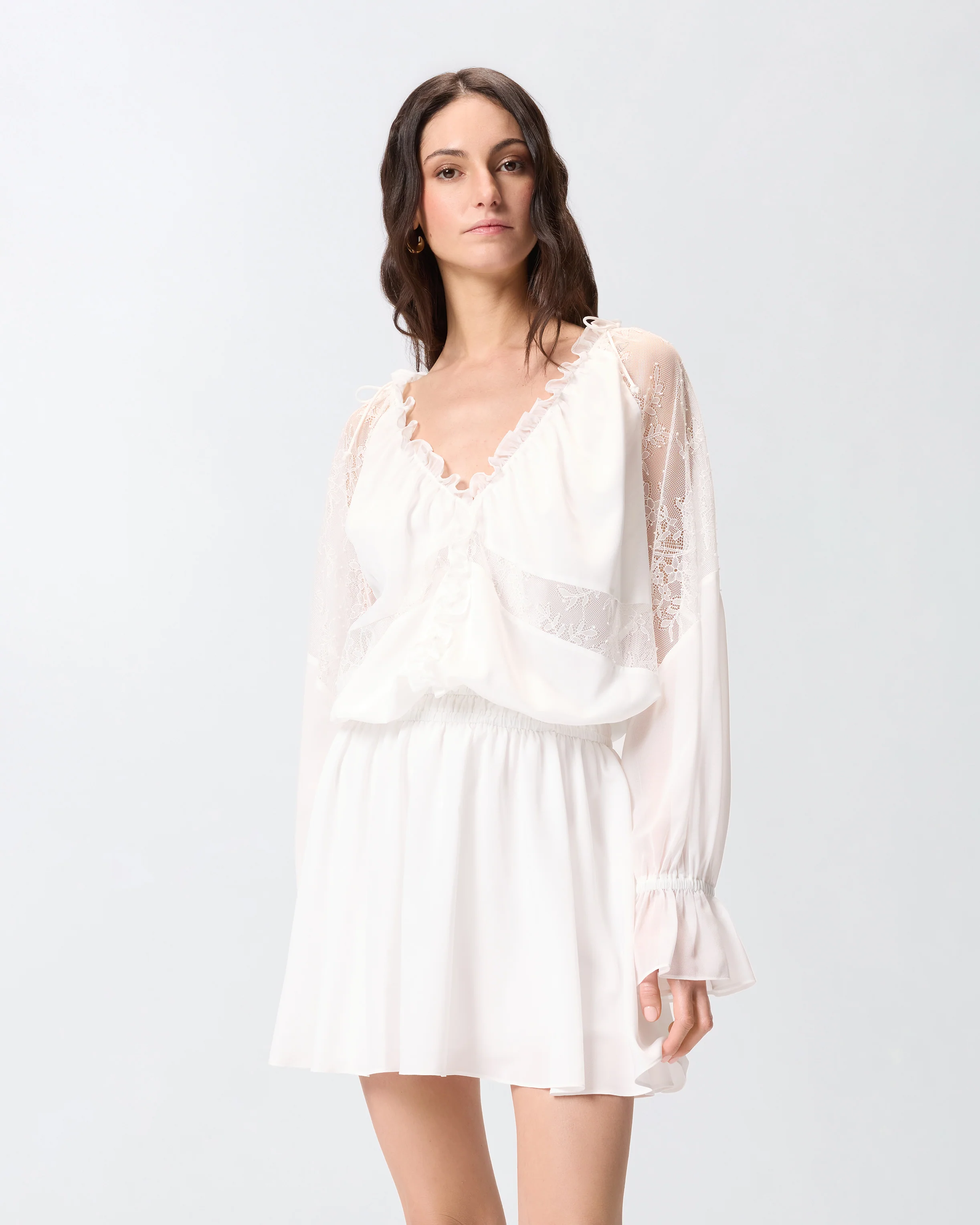 Mini dress with long sleeves and lace details