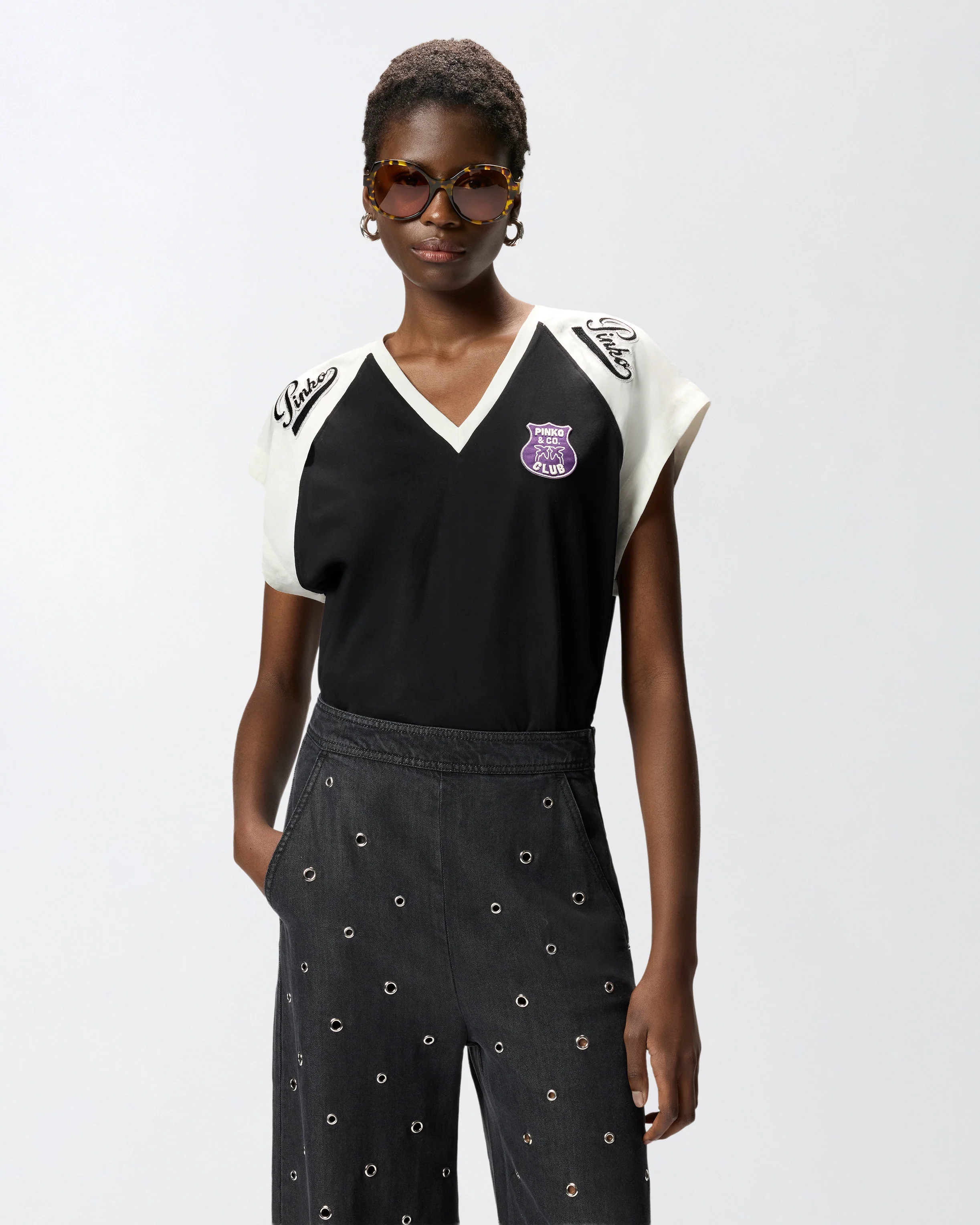 T-shirt with V-neck and branded patches